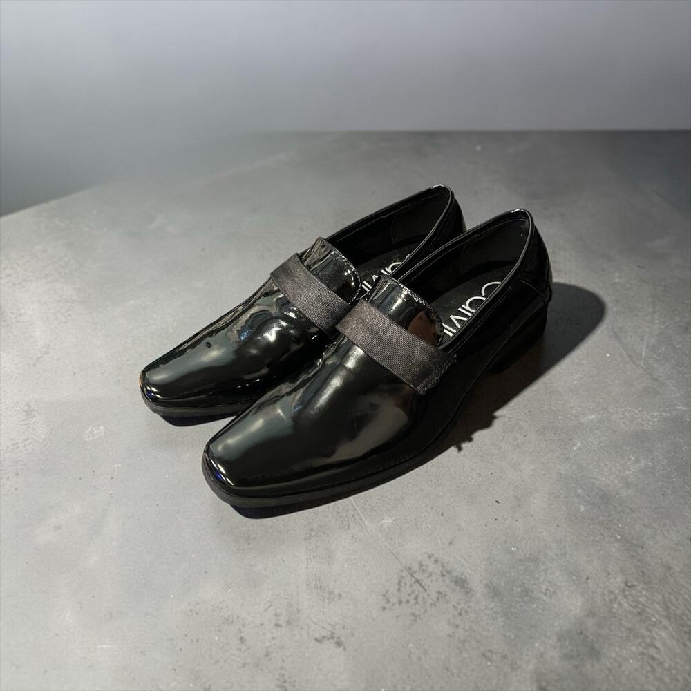 Calvin Klein Bernard loafers featuring a black patent finish Men’s Size 8